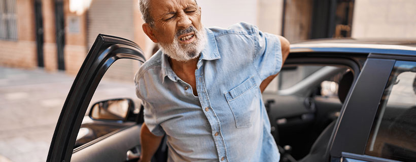 Patient suffering from Back Pain in need of auto accident injury care in Baldwin